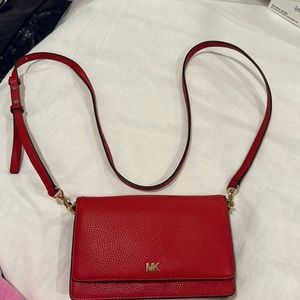 Red Michael Kors crossbody purse